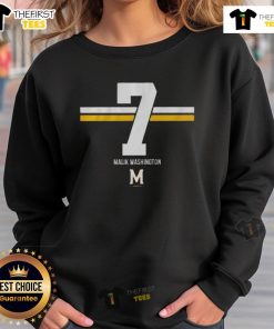 Malik Washington wearing a 7-stripe sweatshirt featuring the Maryland Terrapins football logo.