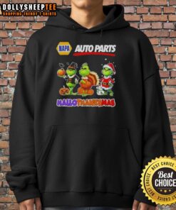 Good Napa Auto Parts X Grinch Cosplay Happy HalloThanksMas Hoodie worn by a cheerful person in festive attire.