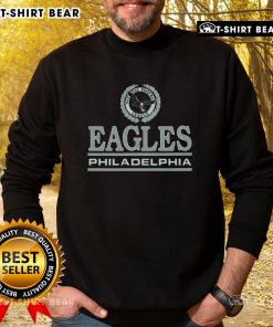 Cozy Philadelphia Eagles crest sweatshirt featuring the iconic team logo in vibrant colors, perfect for fans.