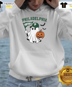 Alt Text: Good Philadelphia Football ghost holding pumpkin and flag in Halloween hoodie for festive sports fans.