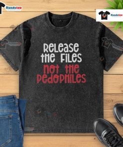 Good Release The Files Not The Pedophiles washed t-shirt design featuring bold text on a casual tee.
