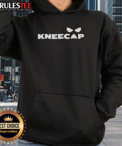 Sami Zayn wearing a stylish kneecap hoodie, showcasing his unique fashion sense in a casual setting.