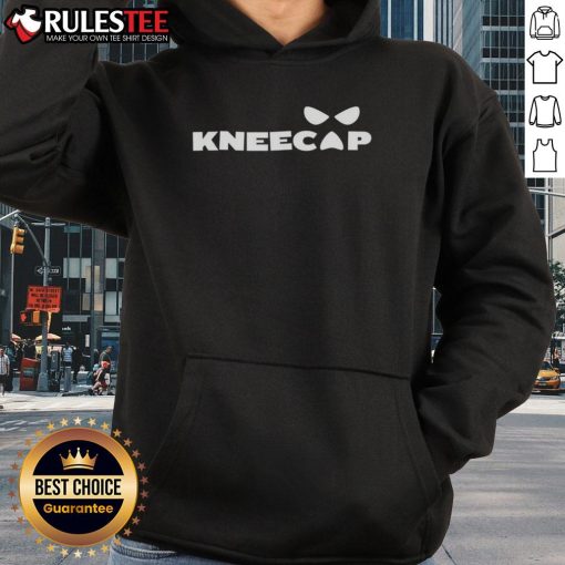 Sami Zayn wearing a stylish kneecap hoodie, showcasing his unique fashion sense in a casual setting.