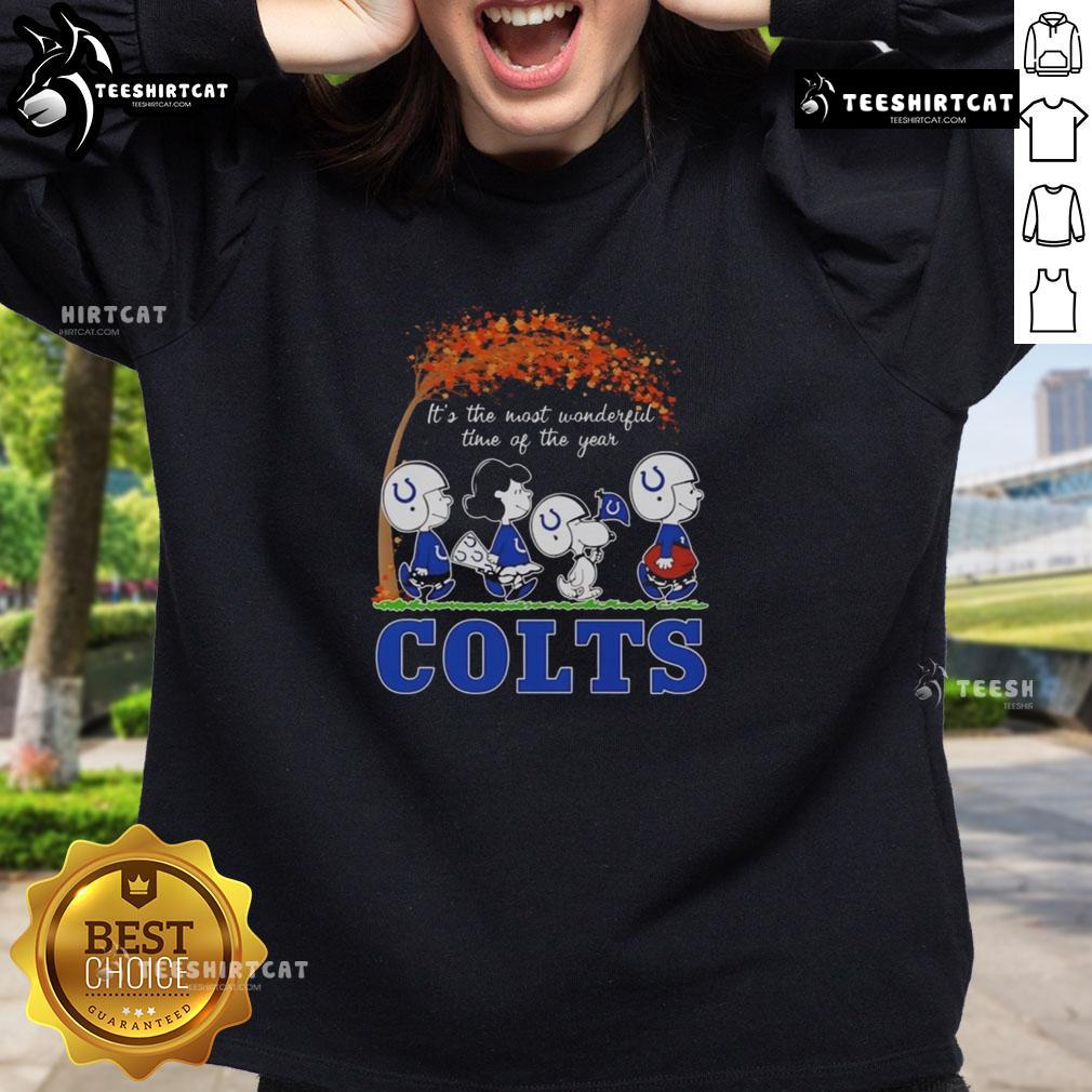 Good Snoopy And Friends X Indianapolis Colts Sports Team It's The Most Wonderful Time Of The Year Autumn Sweatshirt Good Snoopy and Friends X Indianapolis Colts sweatshirt celebrating autumn with festive designs and team spirit.