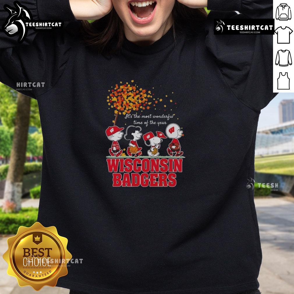 Good Snoopy And Friends X Wisconsin Badgers Sports Team It's The Most Wonderful Time Of The Year Autumn Sweatshirt Good Snoopy and Friends x Wisconsin Badgers sweatshirt for autumn, perfect for sports fans celebrating the season.
