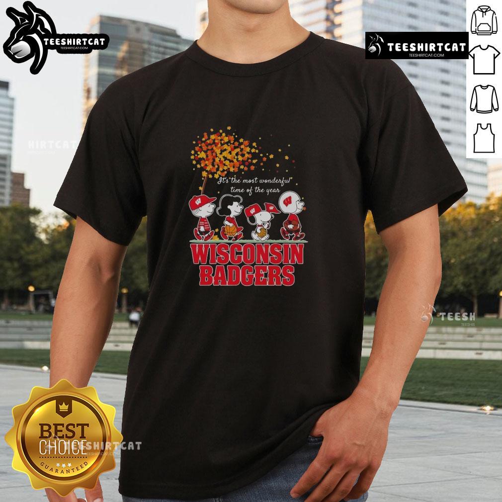 Good Snoopy And Friends X Wisconsin Badgers Sports Team It's The Most Wonderful Time Of The Year Autumn T-Shirt Good Snoopy and Friends X Wisconsin Badgers autumn T-shirt celebrating the festive season and sports spirit.