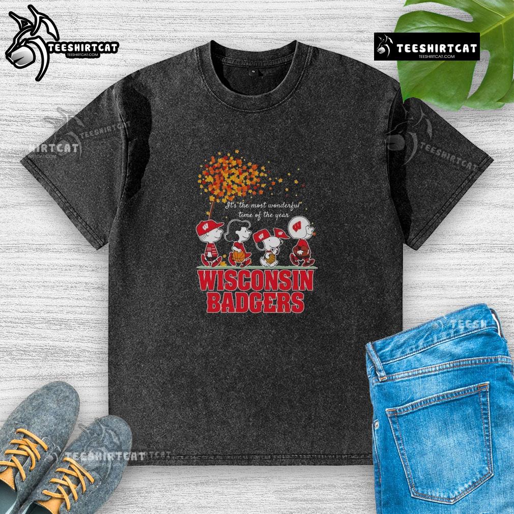 Good Snoopy And Friends X Wisconsin Badgers Sports Team It's The Most Wonderful Time Of The Year Autumn Washed T-Shirt Good Snoopy and Friends x Wisconsin Badgers autumn washed t-shirt, perfect for sports fans celebrating the season.