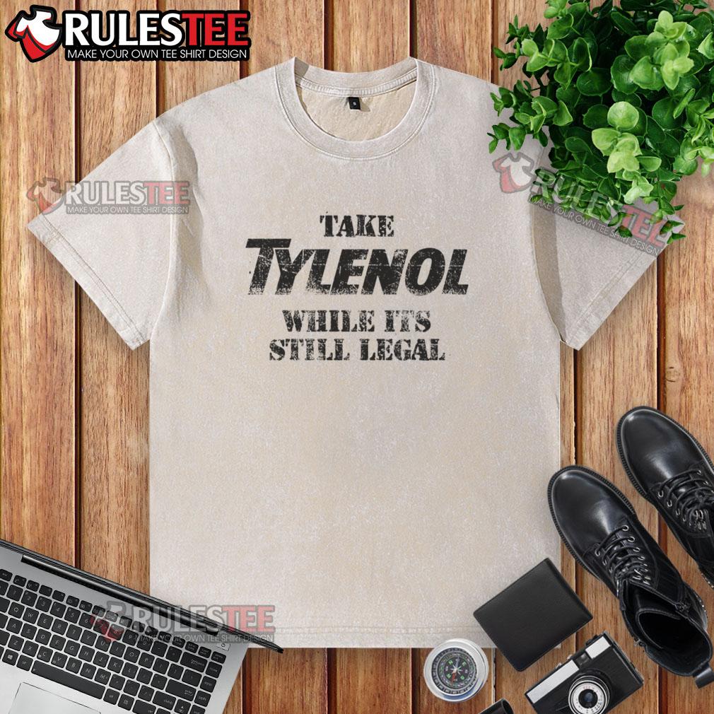 Good Take Medicine While Its Still Legal Washed T Shirt Good Take Medicine While It's Still Legal washed t-shirt displayed on a hanger, showcasing a trendy design for casual wear.