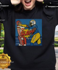 Good Teair Tart slapping Travis Kelce on a stylish sweatshirt, perfect for sports fans and trendy apparel lovers.