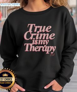 Cozy 'Good True Crime Is My Therapy' sweatshirt displayed on a hanger, perfect for crime enthusiasts and casual wear.