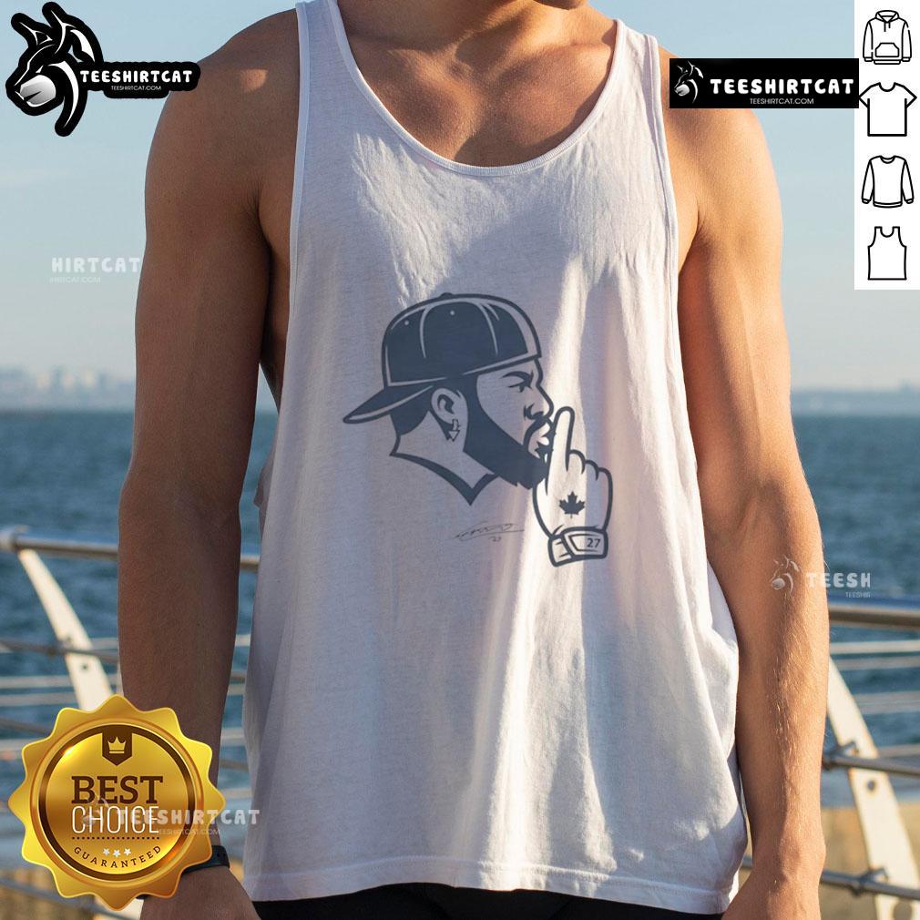 Good Vladdy Shush Vladimir Guerrero Toronto Blue Jays Tank Top Vladimir Guerrero wearing a Toronto Blue Jays tank top, showcasing a fun 'Good Vladdy Shush' design in a vibrant setting.