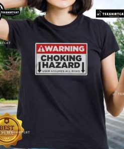 Good Warning Choking Hazard graphic on a ladies tee, highlighting user assumes all risks in a stylish design.