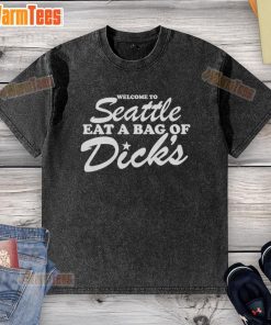 Good Welcome to Seattle Eat a Bag of Dicks washed t-shirt displayed on a hanger, showcasing vibrant design and colors.