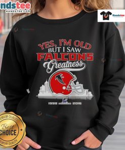 Alt Text: Atlanta Falcons greatness sweatshirt featuring skyline and helmet design, perfect for fans celebrating their team's history.