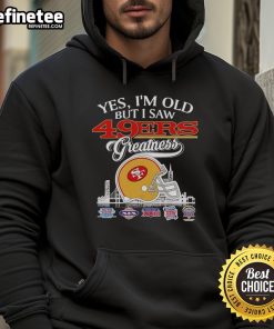 Vintage hoodie featuring San Francisco 49ers helmet against a city skyline, celebrating NFL greatness and nostalgia.