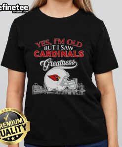 Vintage ladies tee featuring St. Louis Cardinals skyline and helmet design, celebrating team greatness and sports nostalgia.