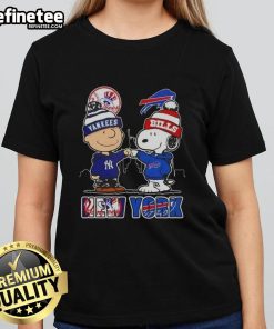 Happy Charlie Brown New York Yankees x Snoopy Buffalo Bills skyline ladies tee featuring iconic sports characters.