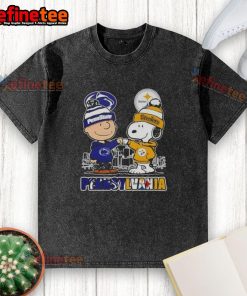 Happy Charlie Brown in Penn State Nittany Lions x Snoopy design on Pittsburgh Steelers skyline washed t-shirt.
