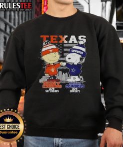 Happy Charlie Brown Texas Longhorns sweatshirt with Snoopy and Dallas Cowboys skyline, perfect for game day style.
