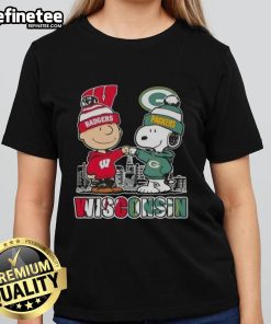 Happy Charlie Brown tee featuring Wisconsin Badgers, Snoopy, and Green Bay Packers skyline for ladies.