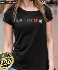 Happy Charlie Kirk wearing a broken heart dove ladies tee, showcasing a stylish and uplifting design.