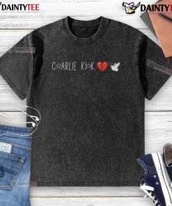 Alt Text: Happy Charlie Kirk wearing a broken heart dove washed t-shirt, showcasing a vibrant design and a cheerful expression.