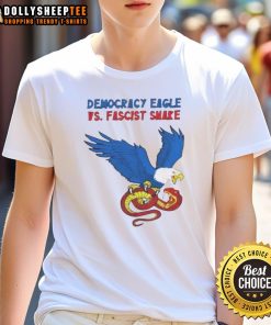 Happy Democracy Eagle Vs Fascist Snake T-Shirt featuring a bold graphic of an eagle and snake representing political ideals.