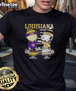 Happy Louisiana Sports T-Shirt featuring Charlie Brown, LSU Tigers, Snoopy, New Orleans Saints, and skyline design.