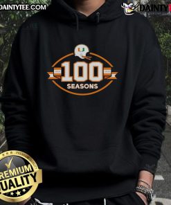 Alt Text: Happy Miami Hurricanes Football 100 Seasons 1926-2025 hoodie featuring vibrant team colors and logo design.