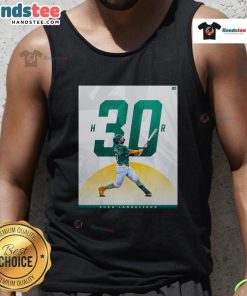 Shea Langeliers wearing a tank top celebrating his 30-homer season with the Oakland Athletics, showcasing team spirit.