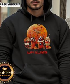 Happy Philadelphia Eagles fans in Halloween-themed coffee hoodies celebrating the holiday with team spirit.