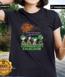 Alt Text: Happy Snoopy and friends in Oregon Ducks gear celebrating autumn in a festive ladies tee design.