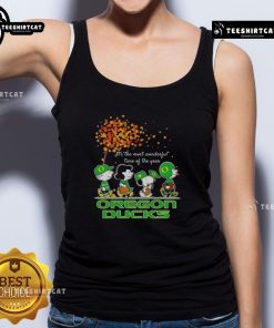 Alt Text: Happy Snoopy and friends in Oregon Ducks gear, celebrating autumn in a festive tank top for sports fans.