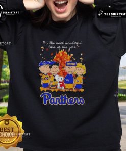 Alt Text: Happy Snoopy and friends wearing Pitt Panthers gear on an autumn sweatshirt, celebrating the most wonderful time of the year.
