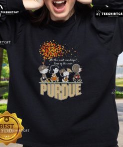 Alt Text: Happy Snoopy and friends on Purdue sports team sweatshirt celebrating autumn and the joy of the season.