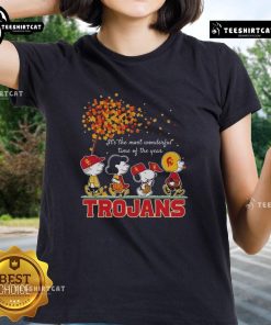 Happy Snoopy and friends on a Trojans sports team autumn tee, celebrating the most wonderful time of the year.