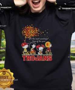 Alt Text: Happy Snoopy and friends in Trojans sports team autumn sweatshirt celebrating the most wonderful time of the year.