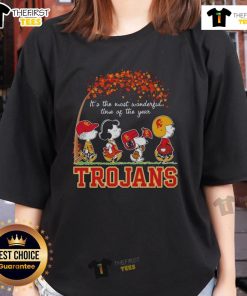 Happy Snoopy and friends in Trojan sports gear, celebrating autumn in a cozy ladies tee, perfect for the season.