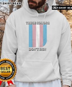 Happy Trans hoodie with 'These Colors Don't Run' slogan, showcasing vibrant colors and a stylish design for pride wear.