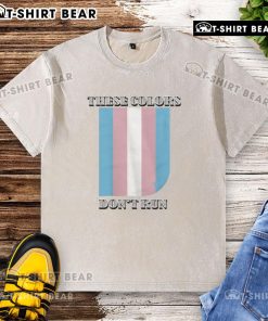 Happy These Colors Don't Run Trans Washed T-Shirt in vibrant colors, showcasing a bold design for pride and inclusivity.