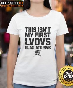 Happy woman wearing a 'This Isn't My First Ludus Gladiatorius' tee, celebrating ancient Roman gladiator school style.