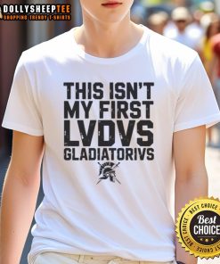 Alt Text: Happy This Isn't My First Ludus Gladiatorius T-Shirt featuring a fun design for ancient Roman gladiator school fans.