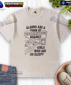 Girl wearing a washed T-shirt with 'Hot Alarms Are A Form Of Discrimination' slogan, highlighting sleepiness and gender bias.