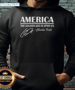 Charlie Kirk wearing a 'Hot America: The Golden Age Is Upon Us' hoodie, promoting patriotic themes and American pride.