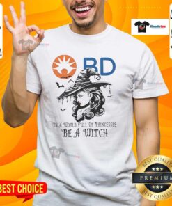 Hot Becton Dickinson Halloween T-Shirt featuring 'In A World Full Of Princesses Be A Witch' design, perfect for spooky season.