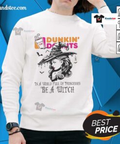 Cozy Halloween sweatshirt featuring 'Be A Witch' design, perfect for enjoying Dunkin' donuts among princesses.