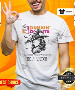 Alt Text: Hot Dunkin' Donuts Halloween T-Shirt featuring 'In A World Full Of Princesses Be A Witch' design. Perfect for spooky season!