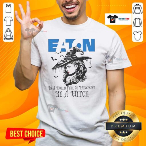 Hot Eaton Corporation 'In A World Full Of Princesses Be A Witch' Halloween T-Shirt featuring a spooky witch design.