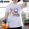 Trump cartoon T-shirt featuring 'Hot Hands Off My Free Speech' slogan, showcasing a bold political statement.