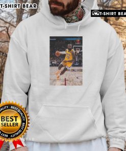 Alt Text: LeBron James in a stylish Los Angeles Lakers hoodie, showcasing his iconic Number 23 pose as a basketball superstar.